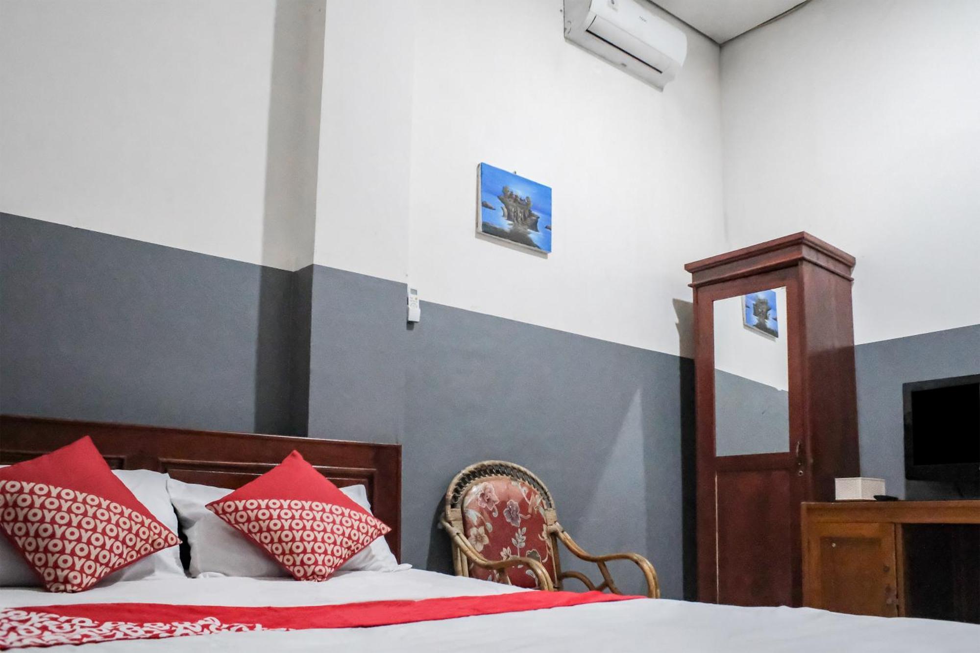 Oyo 93117 Penginapan Tiga Dara Jayapura Extérieur photo